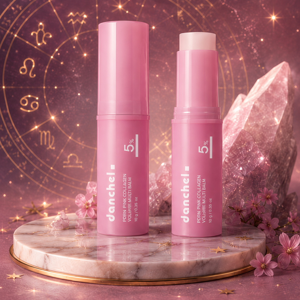 Baume PDRN Pink Collagen — duo de sticks sur plateau marbre avec cristaux